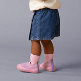 wearing pink shoes