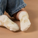 Child wearing white socks