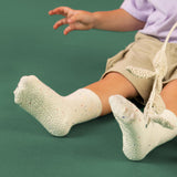 Child wearing white socks