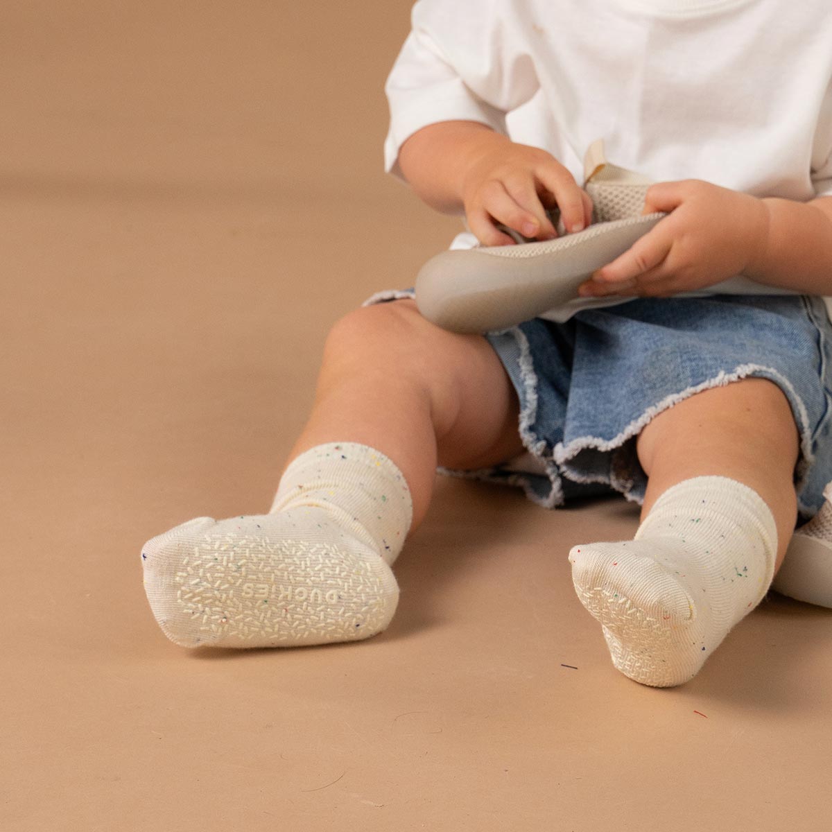 Child wearing white socks