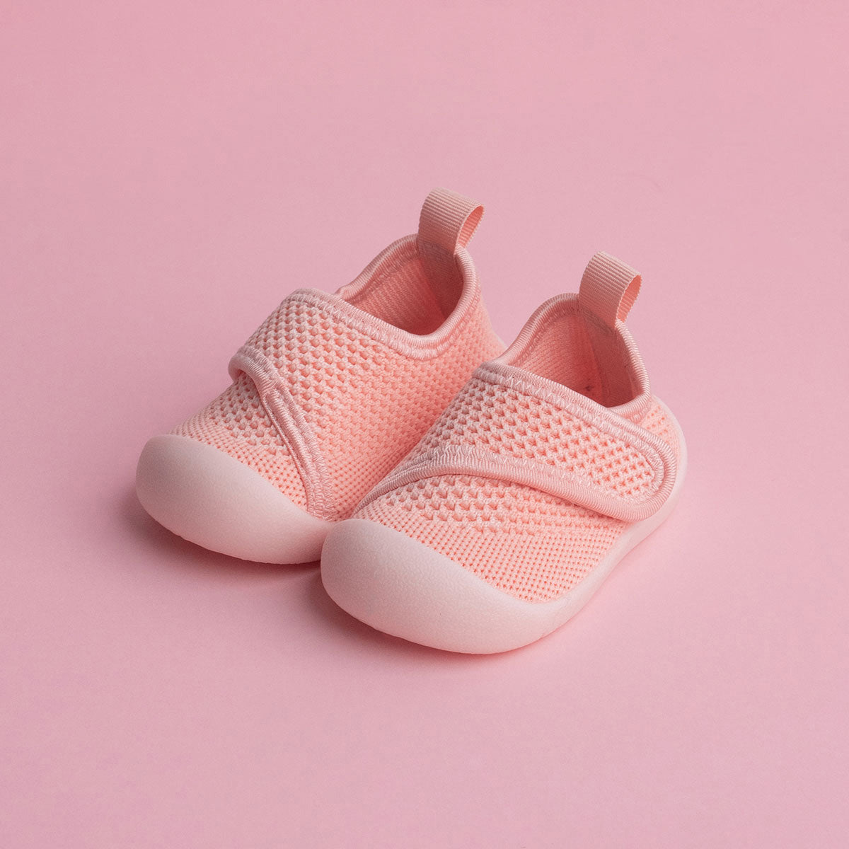 pink baby shoes