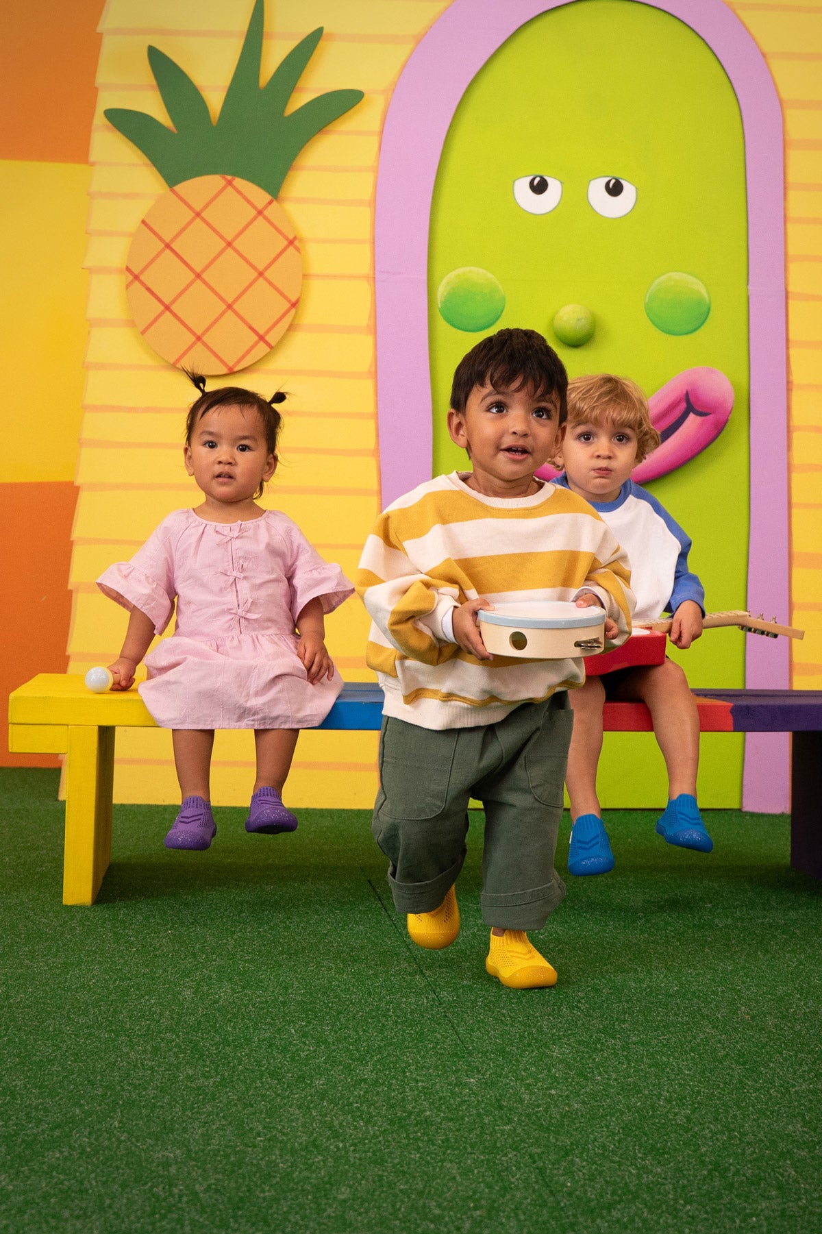 Children in a colorful room