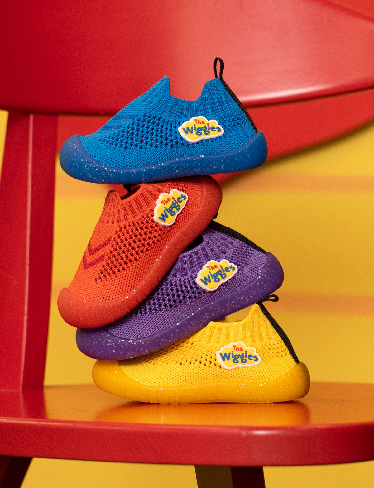 Four colorful children's shoes
