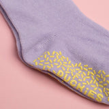 Close-up of a lavender non-slip grip sock