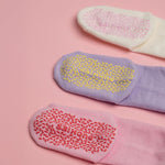 Three pairs of mid-height socks i
