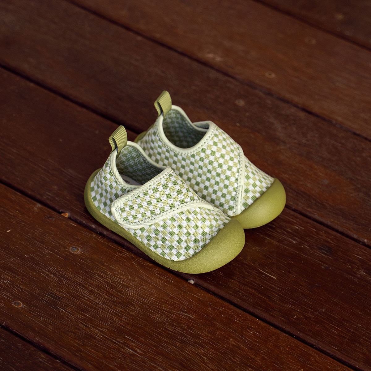 Pair of green baby shoes