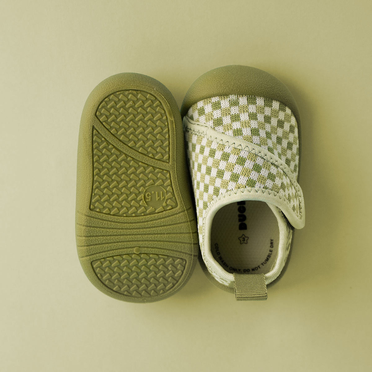 Pair of green baby shoes 