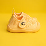 Yellow baby shoe