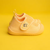 Yellow baby shoe