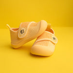 yellow baby shoes