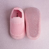 Pair of pink baby shoes
