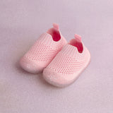 pink baby shoes