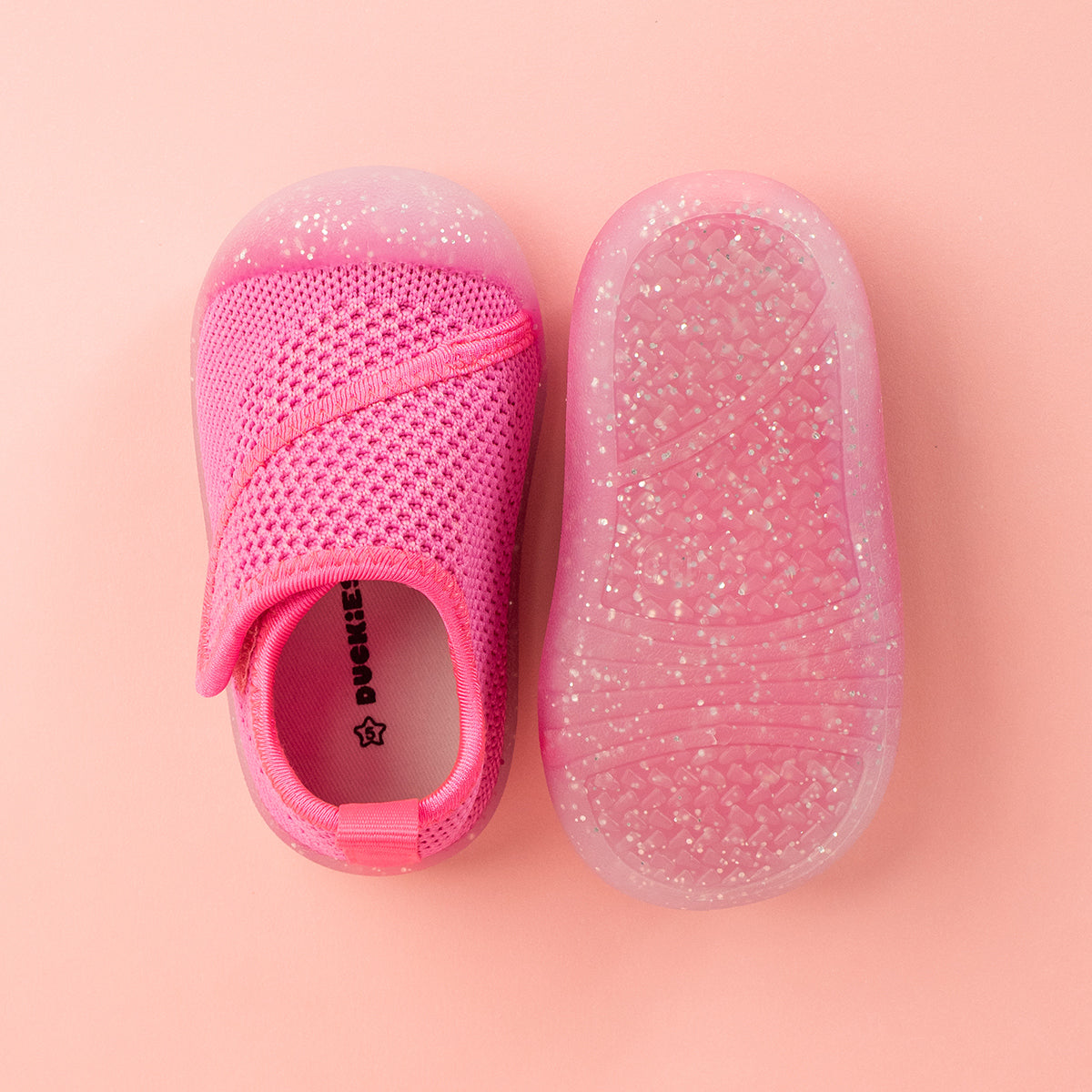 Pink baby shoe with glitter sole