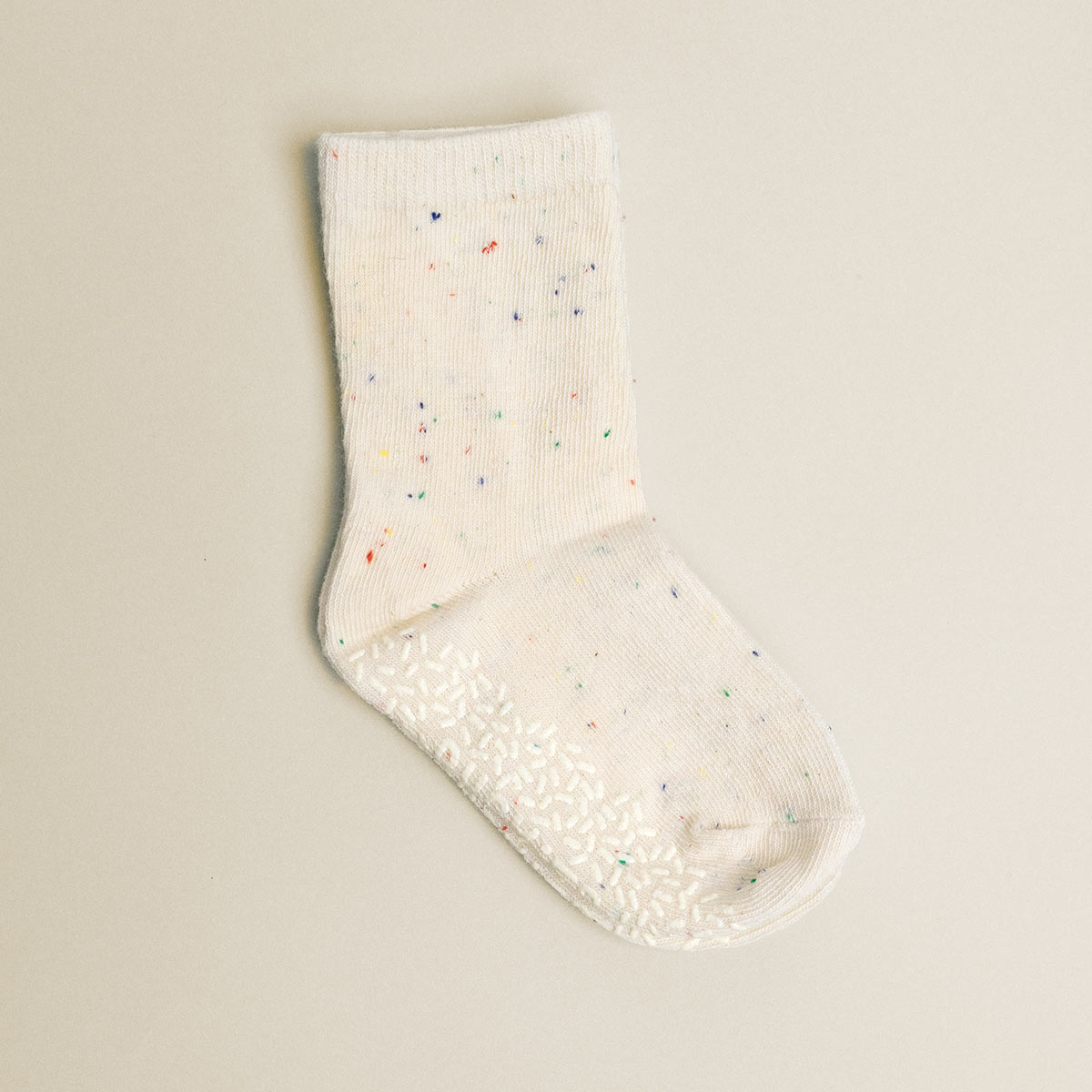 White sock with colorful speckles