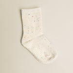 White sock with colorful speckles