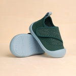 Green and light blue baby shoe