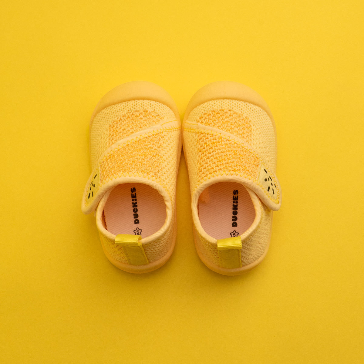duckies children's yellow shoes pair