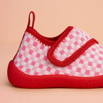 checkered baby shoe